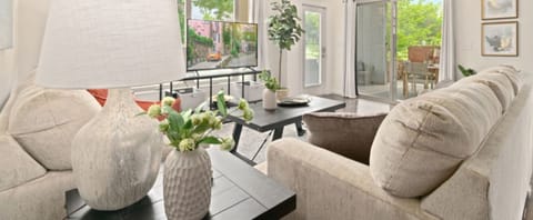 Condo, Multiple Beds, Patio (803 Blondel St #101) | Living area | 42-inch flat-screen TV with digital channels