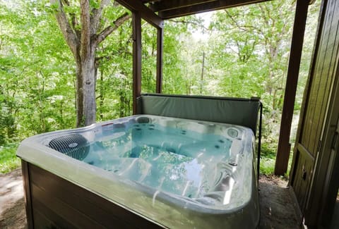 Unwind in the bubbling hot tub surrounded by nature! Whether it’s a morning soak with coffee or a nighttime dip under the stars, this secluded retreat is perfect for relaxation after a day of exploring Hocking Hills.
