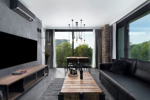 City Apartment, Balcony, City View | Living area | Flat-screen TV