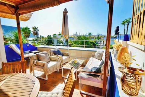 Sun The terrace comes complete with a dining table, lounge area, making it a perfect spot to enjoy meals and soak up the sun. 
