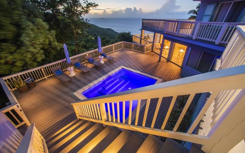 The lower deck has a 11x13 heated pool, 6 loungers, and dining for 10 with a BBQ