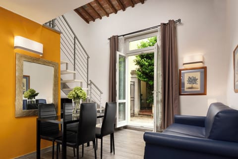 Junior Suite, Garden View | Down comforters, in-room safe, individually decorated, desk
