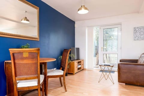 Spacious and serene — a big, relaxing living room with cozy twin sofas and a smart TV for your ultimate downtime.