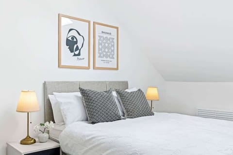 Tranquil and cozy — a relaxing bedroom with a comfortable double bed, perfect for unwinding after a long day.