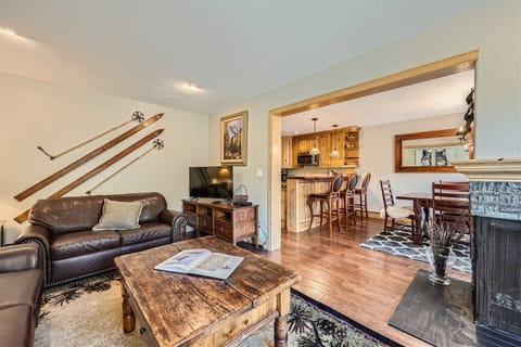 living room looking into kitchen and dining