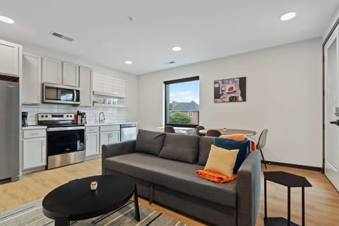 Deluxe Apartment | Living area | 42-inch Smart TV with digital channels