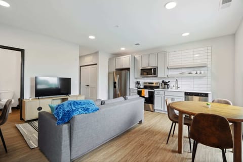 Deluxe Apartment | Living area | 42-inch Smart TV with digital channels