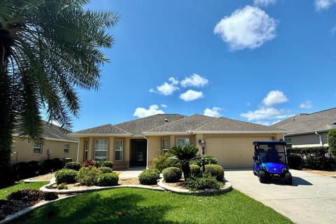 House Front with 2-Seater Golf Cart included.