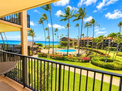 Your view features the ocean, palms, and open sky framing the coastline from the lanai