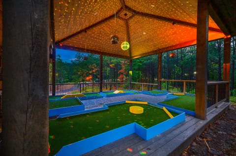 Welcome to White Maple Retreat, where you’ll have a blast playing 5-hole obstacle Glow Putt Putt under the pergola with party-ambiance lighting, LED neon lights, and a glow Bluetooth speaker to set the fun to music.