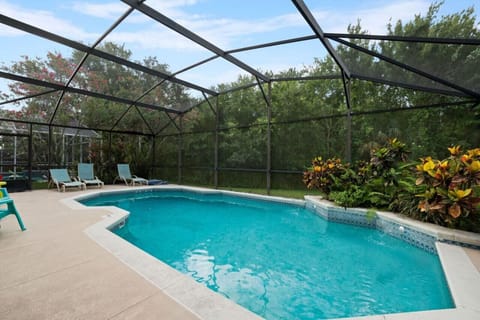 Private screened patio and pool area