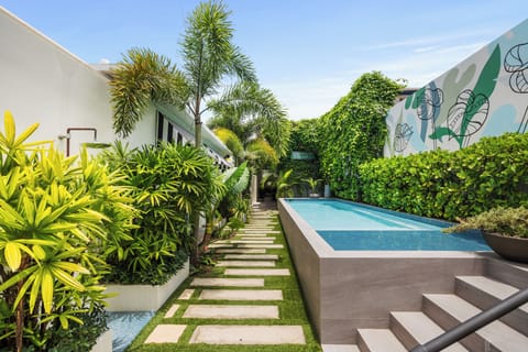 Outdoor pool, open 7:00 AM to 10:00 PM, sun loungers