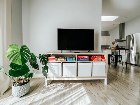 Smart TV with guest Netflix account. Board games and books.