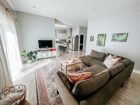 Open concept with over height ceilings give a spacious inviting feel.