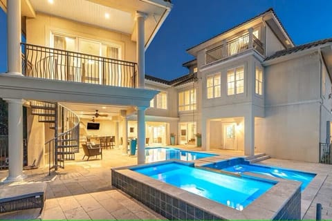 WELCOME TO VILLA BELLISSIMO - A luxurious three-story villa offers private amenities, a private pool and spa, and elegant interiors that blend comfort with coastal charm.