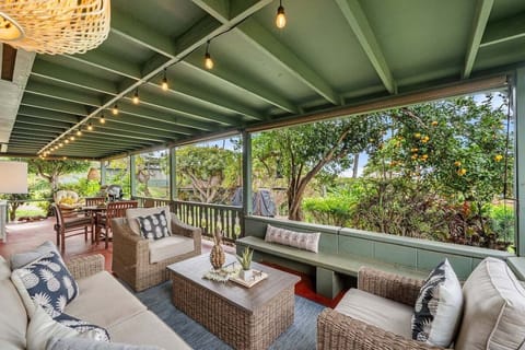 Enjoy the breeze and greenery from this inviting lounge area