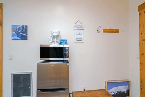 Bedroom 2:  2 full beds, gas fireplace, 50” TV, kitchenette