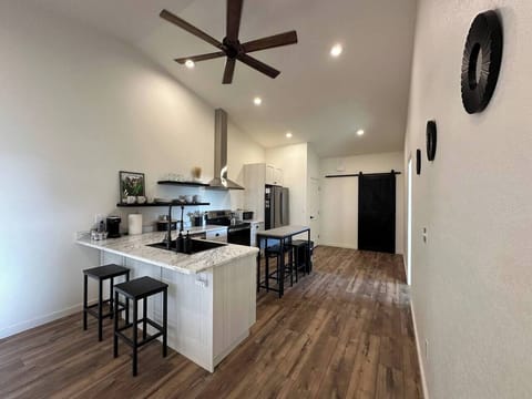 Whether sitting at the bar or extending the center island you have different seating options and can move around the stools.   