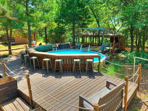 “Relax poolside in the trees and enjoy your own private cabin escape.