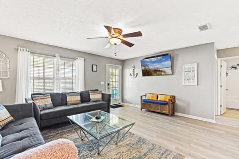 Spacious living room with 2 comfy couches, including a sleeper sofa!