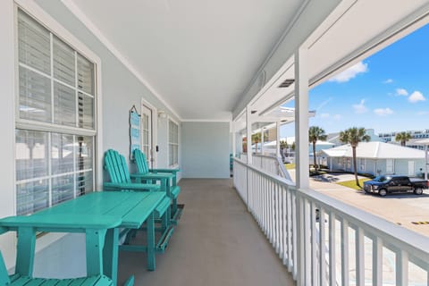 Relax on the front patio with high-top seating