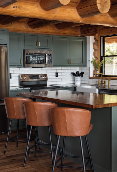 Seating for 3 available at the kitchen island