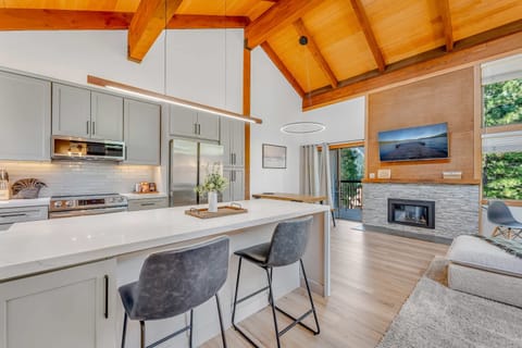 Main Living Space: Kitchen, dining room and living room, open layout, access to private balcony (fireplace is out of service)