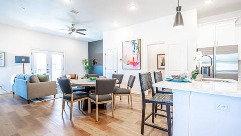 Kick back in a stylish, open-concept living space designed for comfort and connection. Whether you're debriefing after a Rangers game, watching pre-game coverage on the smart TV or just relaxing with your crew—The Ryan's living area has you covered.