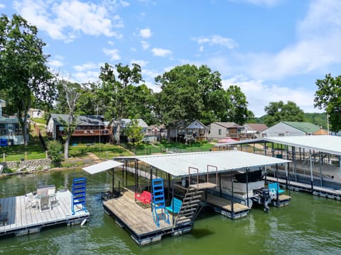 Charming lakeside home with private dock offering direct access to the water for seamless boating and lakeside activities. The perfect retreat for waterfront living.