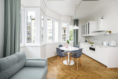 Deluxe Apartment | Living area | 42-inch TV with cable channels