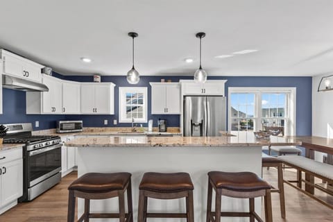 Gleaming Granite Countertops and Stainless Appliances.