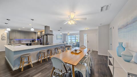 Spacious updated kitchen with island seating for 5, large dining room table with seating for 8.