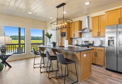 Our open-concept kitchen and dining area are filled with natural light. It’s the perfect spot for cooking, dining, or just chatting over coffee.