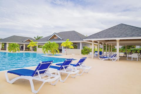 Outdoor pool, open 7:00 AM to 8:00 PM, pool umbrellas, sun loungers