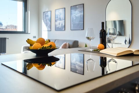 Deluxe Apartment | Living area | Flat-screen TV