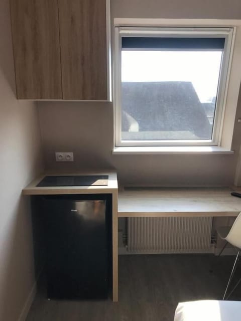 Desk, laptop workspace, free WiFi, bed sheets