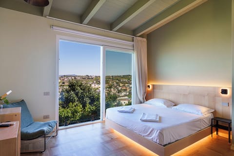 Standard Double Room, Sea View | Minibar, in-room safe, free WiFi