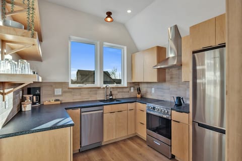 Full kitchen with granite countertops for evenings you just want to cook in.
