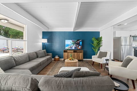 This stunning area features architecturally designed wooden ceilings that add a touch of rustic charm and elegance.