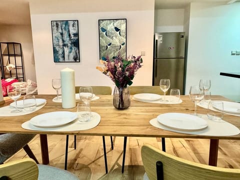 Plates and wine glasses are provided