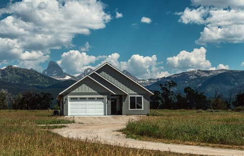 Front of home feat Tetons in the back