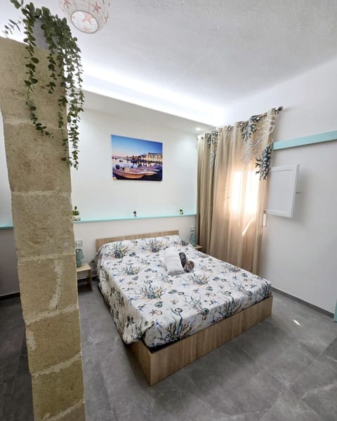 Deluxe Room, Courtyard View | In-room safe, blackout drapes, soundproofing, free WiFi