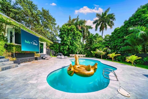 Heated Pool with Swan Floatie