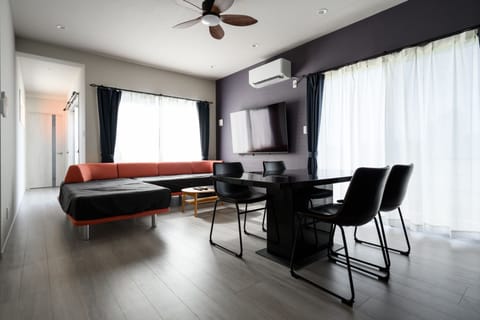 Comfort House | Living area | Flat-screen TV
