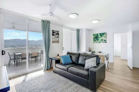 Sit back and relax in the open-plan living area as you enjoy your favourite shows on the large TV. 