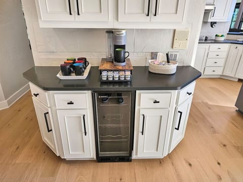 Start your mornings right at our fully stocked coffee station.”