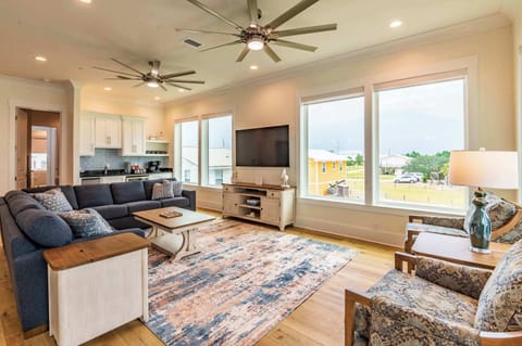 Curl up in the chic living room & stream your favorites on the smart TV