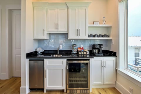 The open, airy kitchen offers ample space & all the comforts of home