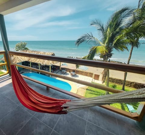 Deluxe Room, Balcony, Beach View | Desk, laptop workspace, WiFi (free), individually decorated