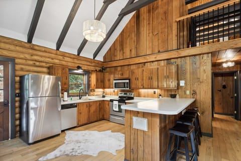 Open Kitchen with Stainless Steel Appliances